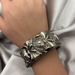 Vintage Repoussé Hinged Bangle Bracelet - Ornate Floral Scroll Design